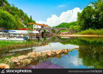 The medieval Rijeka Crnojevica town boasts the medieval architecture and the scenic nature, Montenegro.. The medieval Rijeka Crnojevica