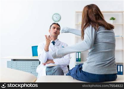 The mentally ill woman patient during doctor visit. Mentally ill woman patient during doctor visit