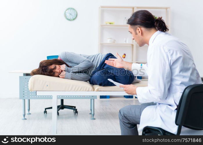 The mentally ill woman patient during doctor visit. Mentally ill woman patient during doctor visit