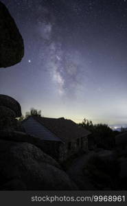 The Milky Way shines over the shelter atop Sharp Top Mountain within the Peaks of Otter in the Virginia Blue Ridge Mountains.