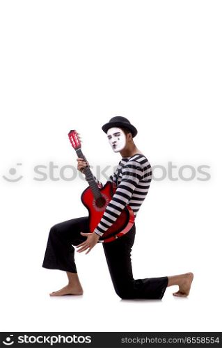 The mime playing guitar isolated on white. Mime playing guitar isolated on white