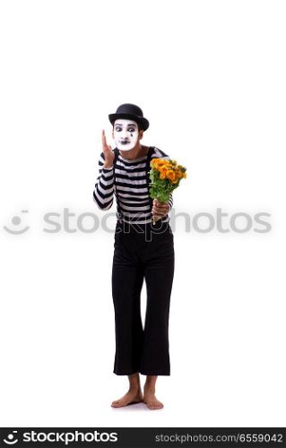 The mime with bunch of flowers isolated on white. Mime with bunch of flowers isolated on white