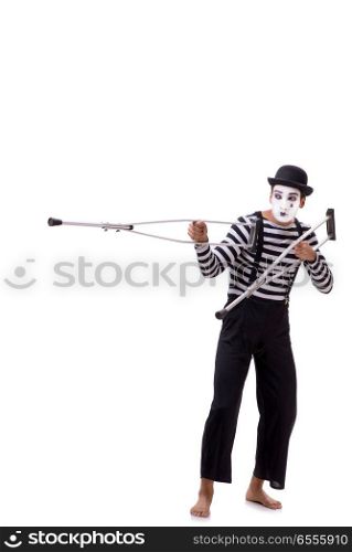 The mime with crutches isolated on white background. Mime with crutches isolated on white background