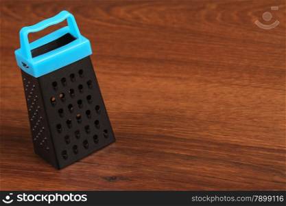 The Mini Grater on the wood