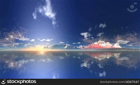 The mirror surface of the water reflects the blue sky, floating clouds and the coastal mountains. A bright sun rises slowly from the misty horizon.