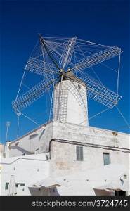 The Moli des comte (Count&acute;s Mill) in Ciutadella, Menorca, Spain. This corn wind mill was built in 1762 and was preserved in fine state to this day.