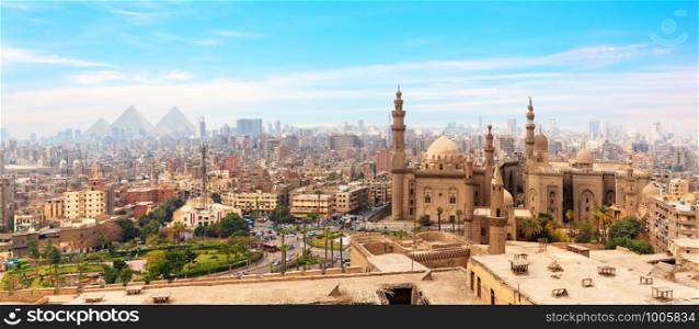 The Mosque-Madrassa of Sultan Hassan in the panorama of Cairo, Egypt.. The Mosque-Madrassa of Sultan Hassan in the panorama of Cairo, Egypt