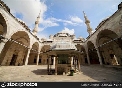 The Mosque of the Prince (Turkish: Sehzade Mehmet Camii) courtyard with ablution fountain in the middle, Istanbul, Turkey