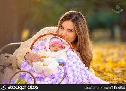 The mother lay down at the baby in the basket, and looked into the frame