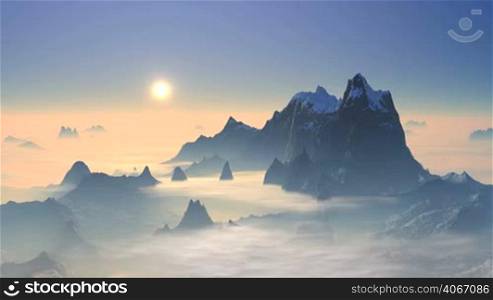The mountain peaks are covered with snow. Beneath them slowly floating clouds. The bright sun slowly sets behind the misty horizo