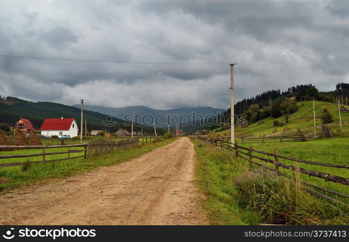 the mountain road through the village