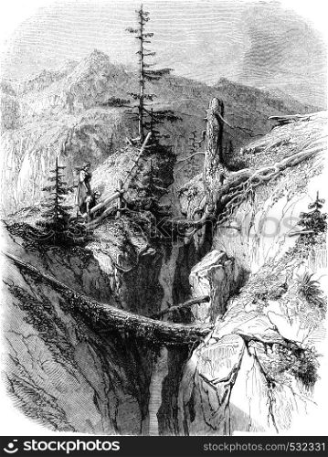 The mountain splits, vintage engraved illustration. Magasin Pittoresque 1852.
