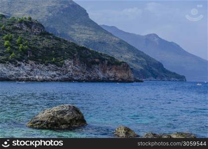 The mountains fall abruptly at the height of the reserve of the zingaro sicily