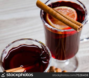 The mulled wine glintwine served in glasses for christmas table. Mulled wine glintwine served in glasses for christmas table