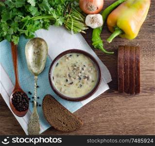 The mushroom soup served on the table. Mushroom soup served on the table