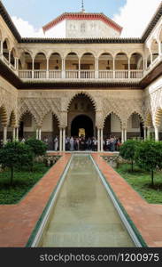 The name, meaning The Courtyard of the Maidens , refers to the legend that the Moors demanded 100 virgins every year as tribute from Christian kingdoms in Iberia. Alcazar of Sevilla, Spain. The Courtyard of the Maidens