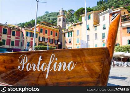 The name of the famous Portofino town in Italy on a boatside - landmark sign, no copyright