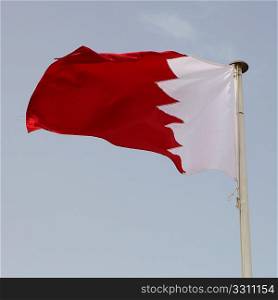 The national flag of Gulf Co-operation Council member Bahrain