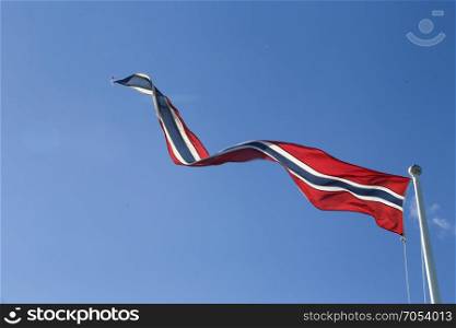 The National flag of Norway blowing in the wind