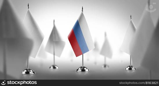 The national flag of the Russia surrounded by white flags.. The national flag of the Russia surrounded by white flags