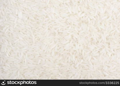 The natural texture - grains of white rice close-up.