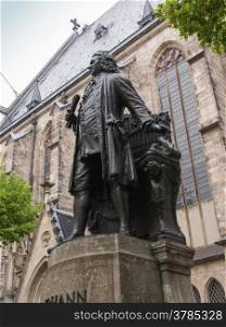 The Neues Bach Denkmal meaning new Bach monument stands since 1908 in front of the St Thomas Kirche church where Johann Sebastian Bach is buried in Leipzig Germany