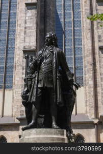 The Neues Bach Denkmal meaning new Bach monument stands since 1908 in front of the St Thomas Kirche church where Johann Sebastian Bach is buried in Leipzig Germany