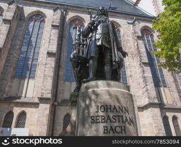 The Neues Bach Denkmal meaning new Bach monument stands since 1908 in front of the St Thomas Kirche church where Johann Sebastian Bach is buried in Leipzig Germany