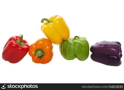 The newest bell pepper hybrid, named Bluejay, adds purple to the lineup of colorful bell peppers that can be used to add color and drama to a salad or dish. Shot on white background.