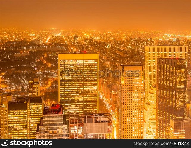 The night view of new york manhattan during sunset. Night view of New York Manhattan during sunset