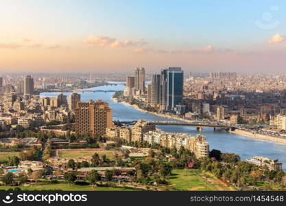 The Nile and the skyscrappers of Cairo, Egypt.. The Nile and the skyscrappers of Cairo, Egypt