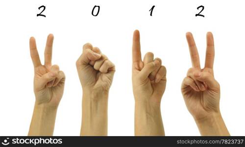 The number 2012 are shown via fingers in creative New Year greeting card