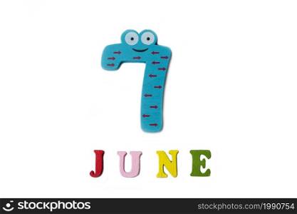 The number seven and the word June on a white background. Calendar.. The number seven and the word June on a white background.