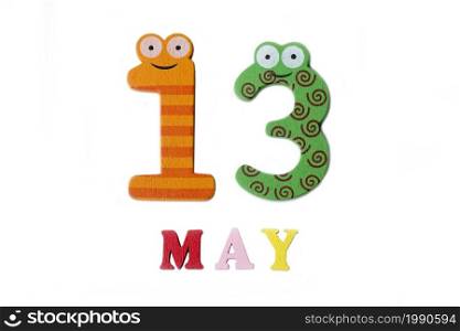 The number thirteen and the word may on a white background. Calendar.. The number thirteen and the word may on a white background.