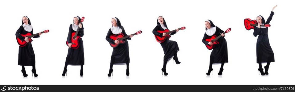 The nun playing guitar isolated on white. Nun playing guitar isolated on white