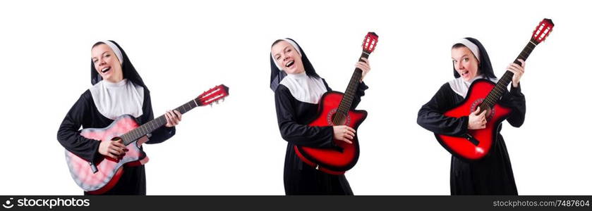 The nun playing guitar isolated on white. Nun playing guitar isolated on white