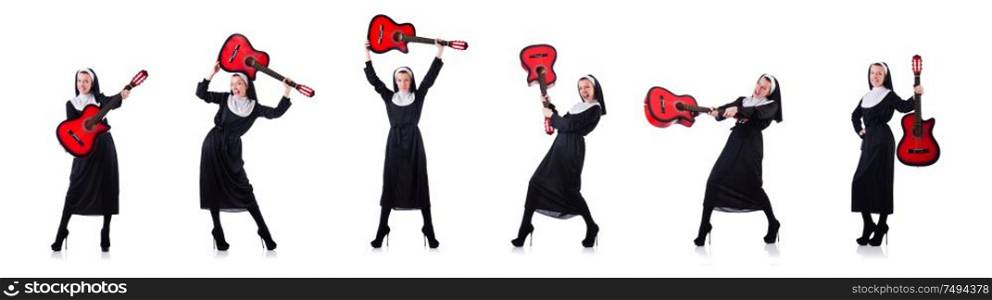 The nun playing guitar isolated on white. Nun playing guitar isolated on white