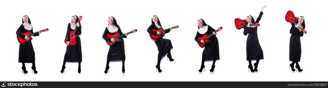 The nun playing guitar isolated on white. Nun playing guitar isolated on white