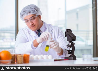 The nutrition expert testing food products in lab. Nutrition expert testing food products in lab