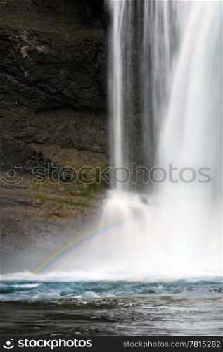 The Ofaerufoss waterfal in the Eldgja volcanic canyon of Iceland&rsquo;s Landmannalaugar national park with a rainbow in front