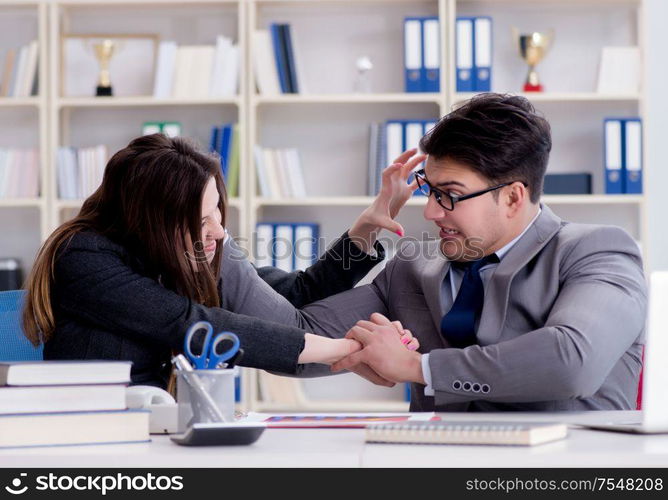 The office conflict between man and woman. Office conflict between man and woman