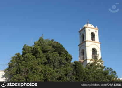 The Ojai Post Office Tower with a beautiful blue sky in the background.