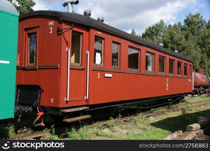 The old carriage from narrow-gauge road