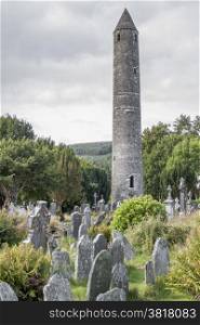 The Old Cemetery. The round tower that stands in St. Kevin&rsquo;s Graveyard in Glendalough, County Wicklow, Ireland.