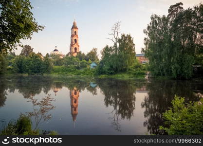 The old church by the lake. Ancient architecture in Russia. old church by the lake. Ancient architecture in Russia