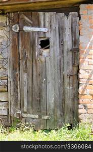 The old closed door in a shed