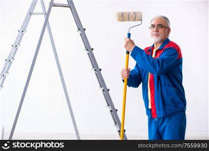 The old contractor doing renovation at home. Old contractor doing renovation at home