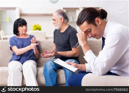 The old couple visiting psychiatrist doctor. Old couple visiting psychiatrist doctor