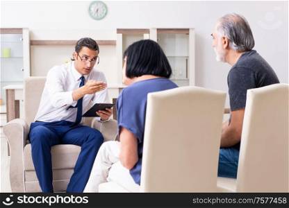 The old couple visiting psychiatrist doctor. Old couple visiting psychiatrist doctor