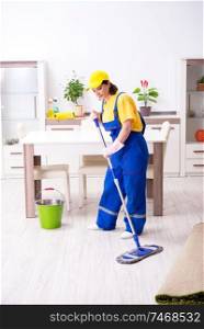 The old female contractor doing housework . Old female contractor doing housework 